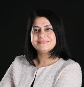 Professional headshot of Dr. Millia Begum, DHA-licensed psychiatrist in Dubai, expert in trauma therapy, EMDR, and IFS.